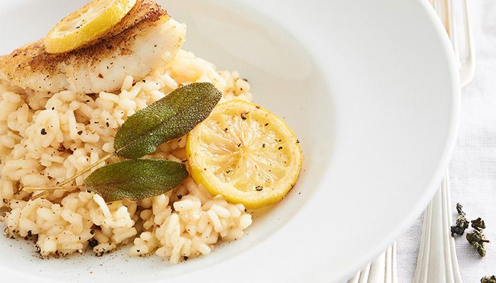 Risotto mit Fischfilet und Zitrone